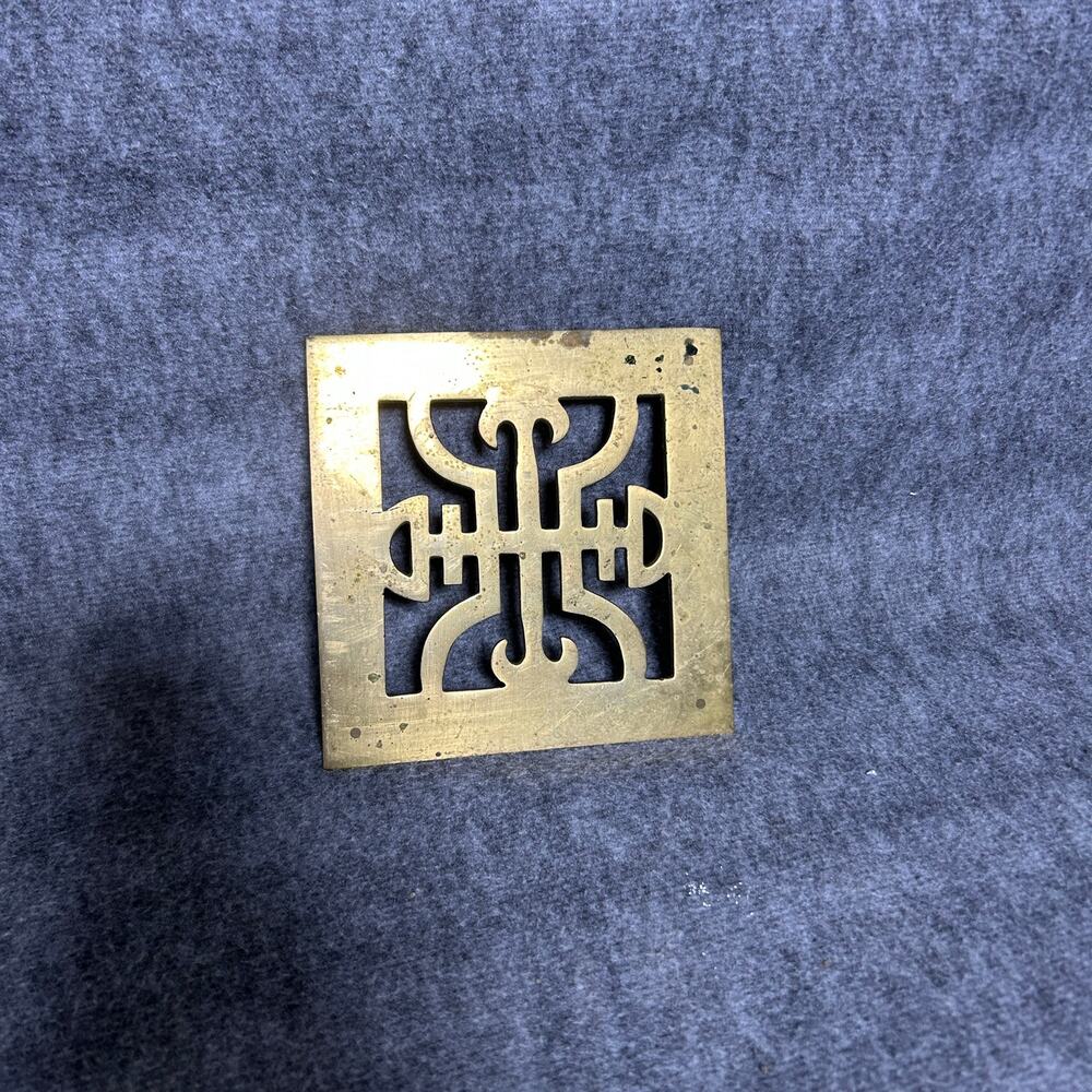 Vintage brass trivet, Asian style